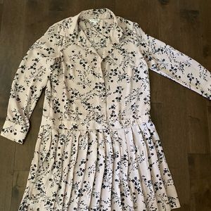 Pink shirt dress with black flowers